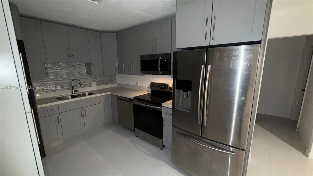 South Florida Real Estate | View 1935 Rodman St, Front | 2 Beds, 2 Baths