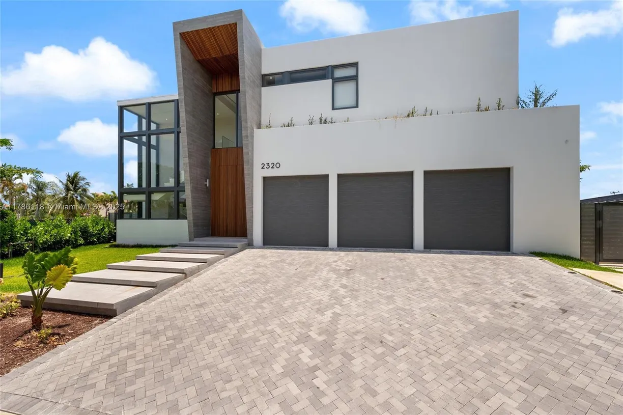South Florida Real Estate | View 2320 NE 49th St | 5 Beds, 6 Baths