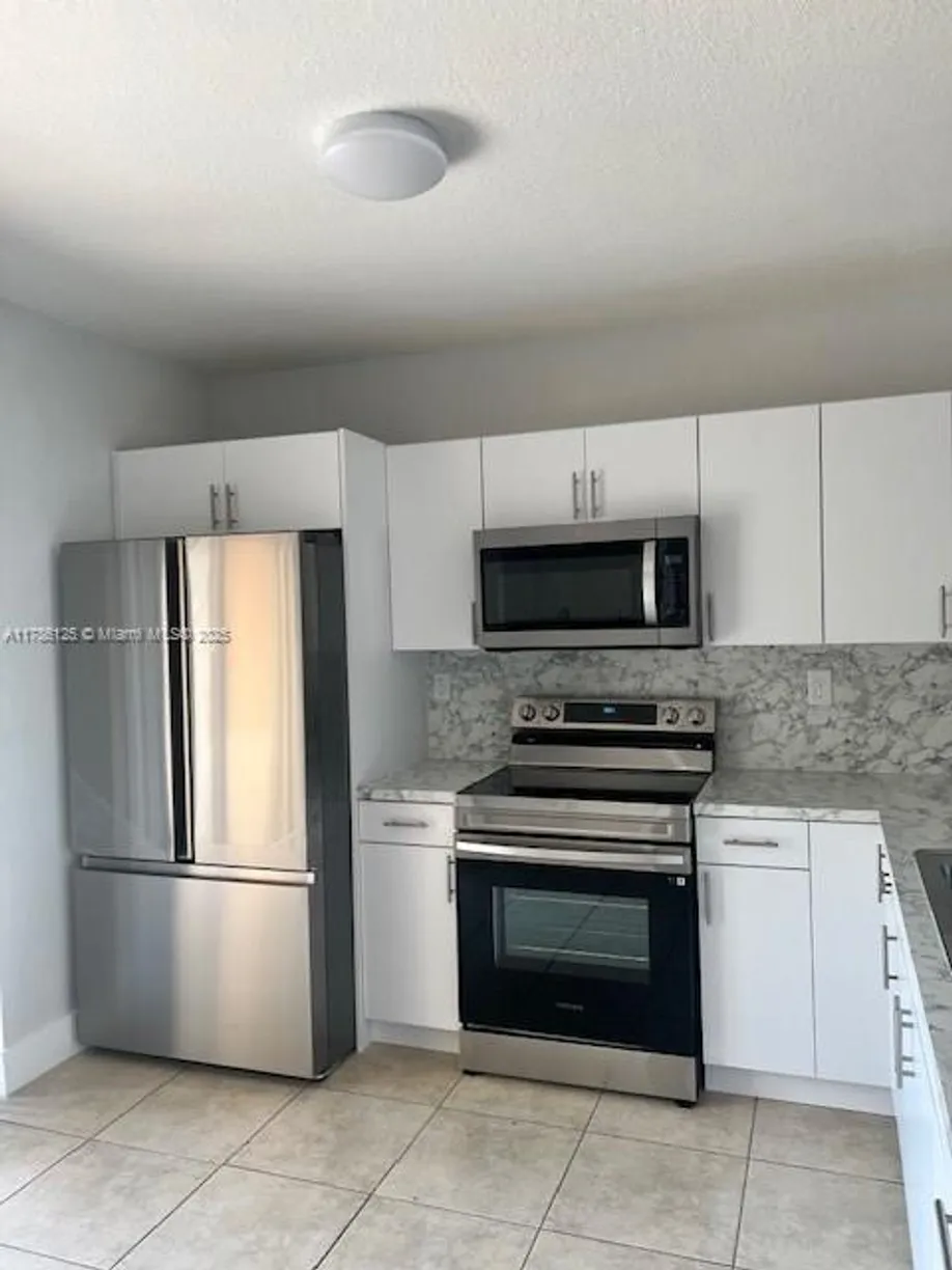South Florida Real Estate | View 120 E 5 ST, 8 | 3 Beds, 2 Baths