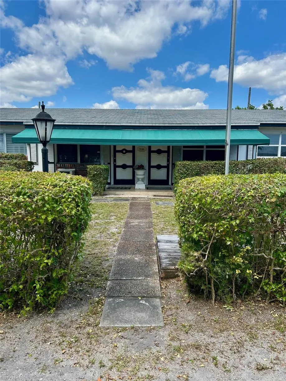 South Florida Real Estate | View 1120 N 59th Ave, N | 2 Beds, 1 Bath
