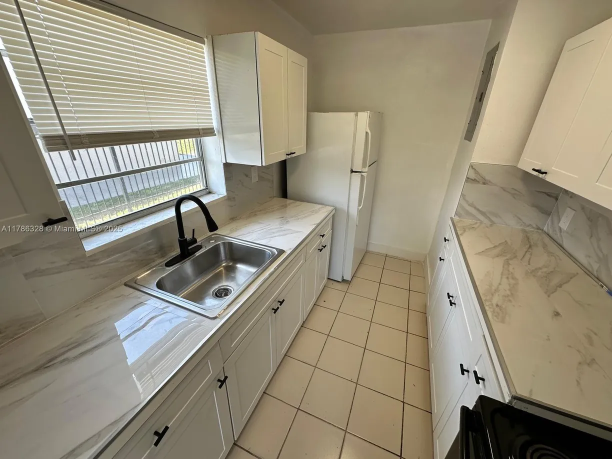 South Florida Real Estate | View 6029 Polk St, 1 | Listing