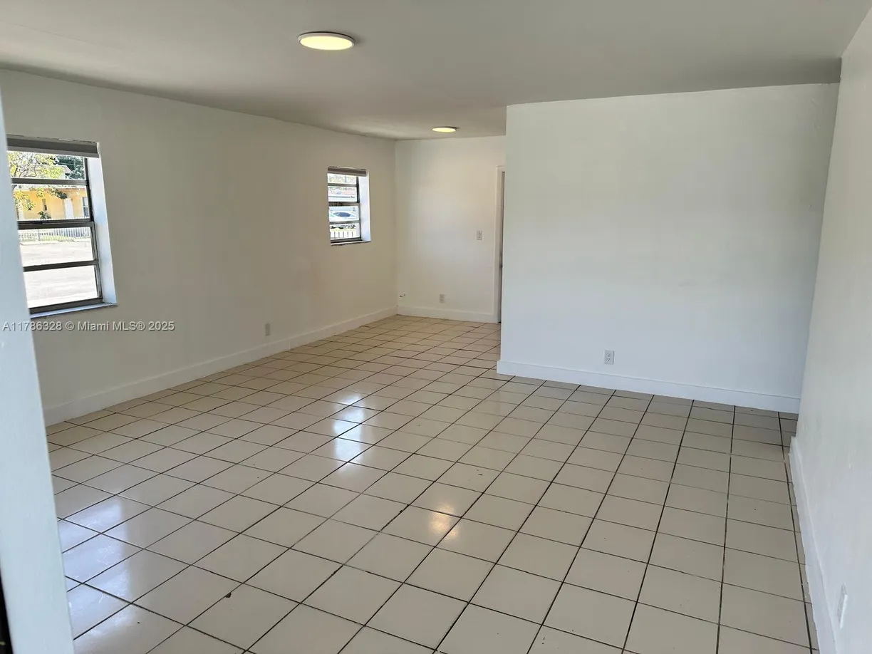 South Florida Real Estate | View 6029 Polk St, 1 | 2 Beds, 1 Bath