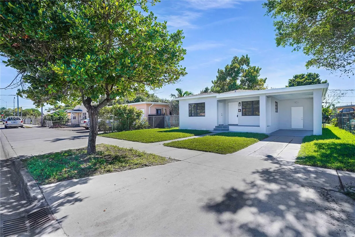 South Florida Real Estate | View 50 E 13th St | 3 Beds, 2 Baths