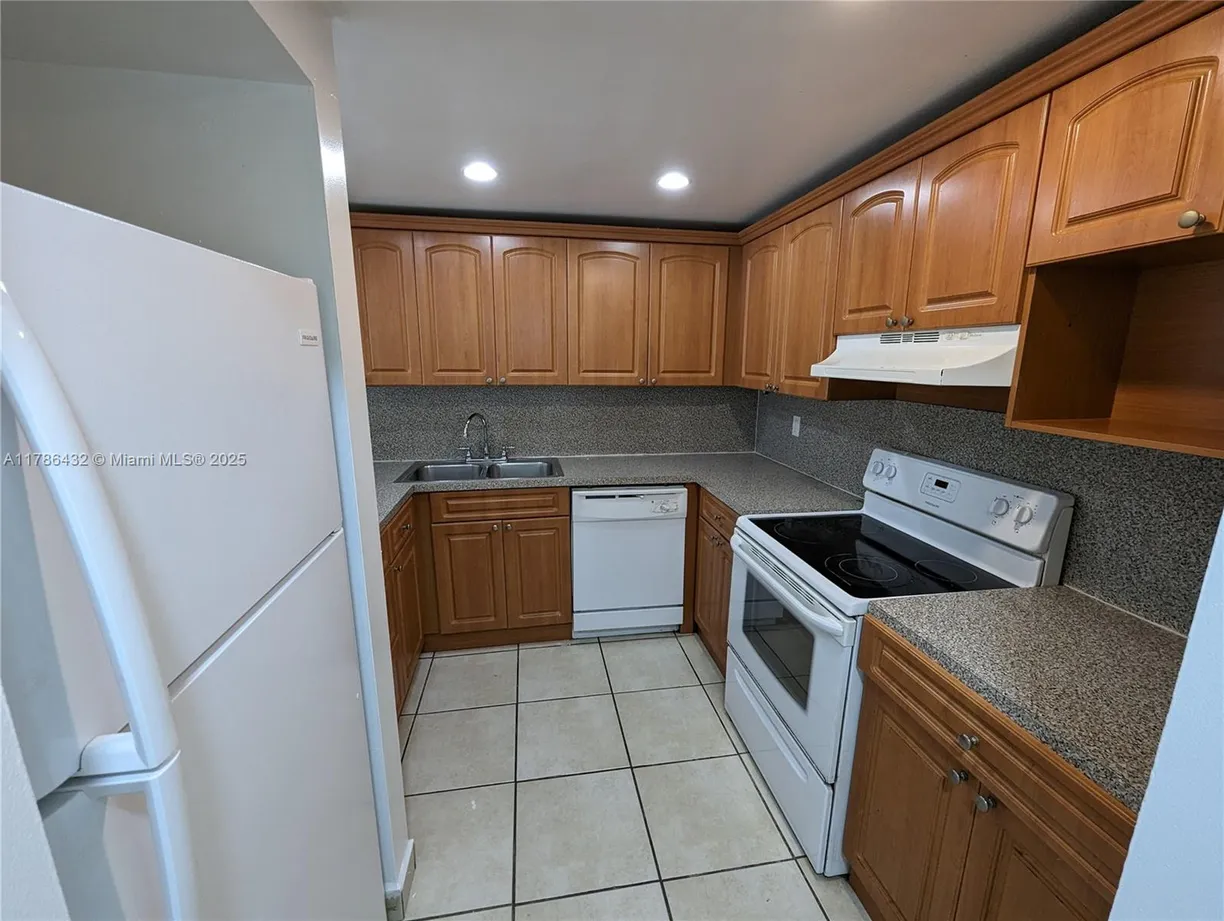 South Florida Real Estate | View 6960 Miami Gardens Dr, 2-222 | 2 Beds, 2 Baths
