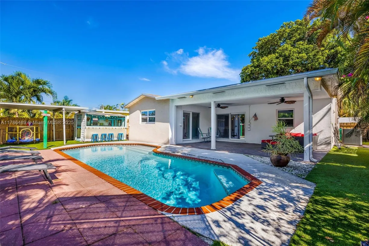 South Florida Real Estate | View 4330 SW 34th, Ln | 4 Beds, 2 Baths
