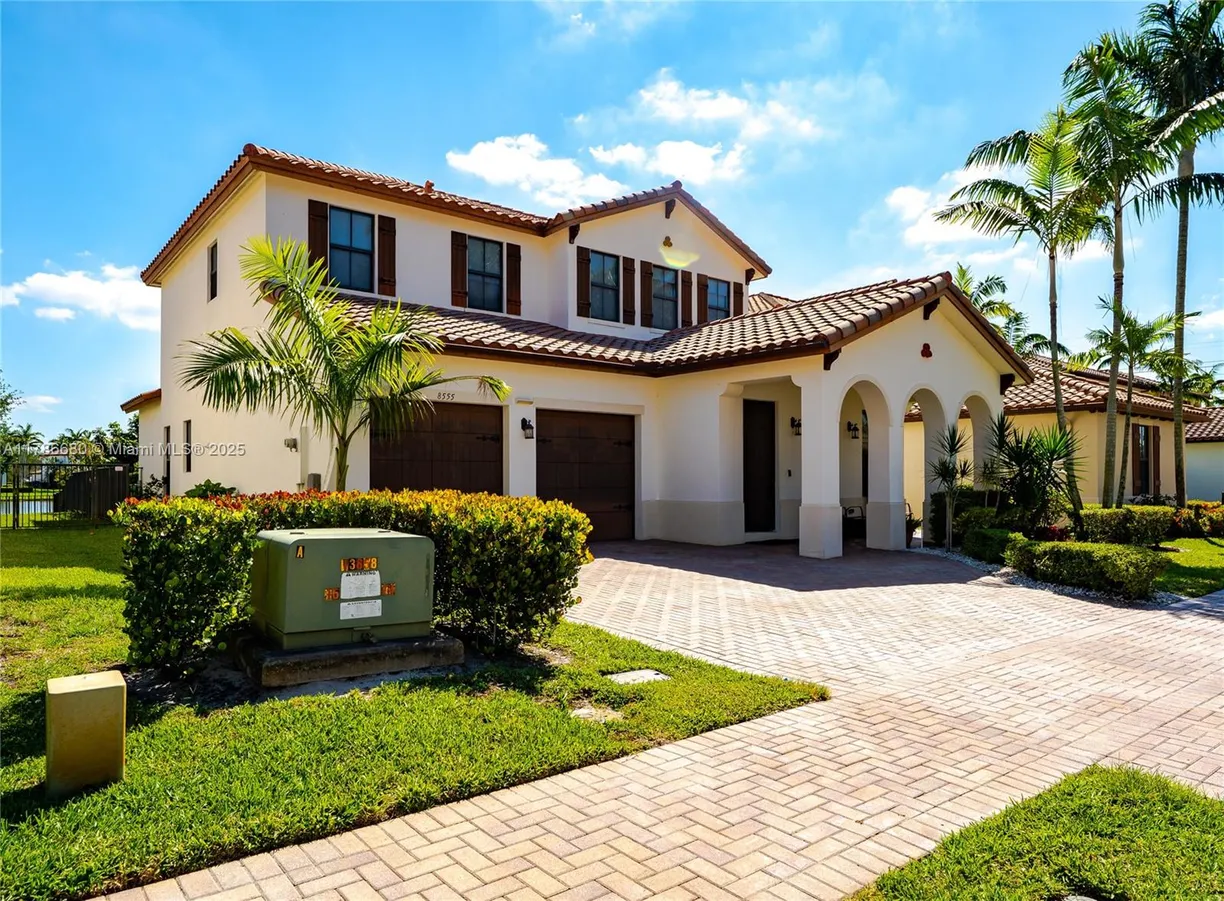 South Florida Real Estate | View 8555 NW 37th Ct | 4 Beds, 3 Baths