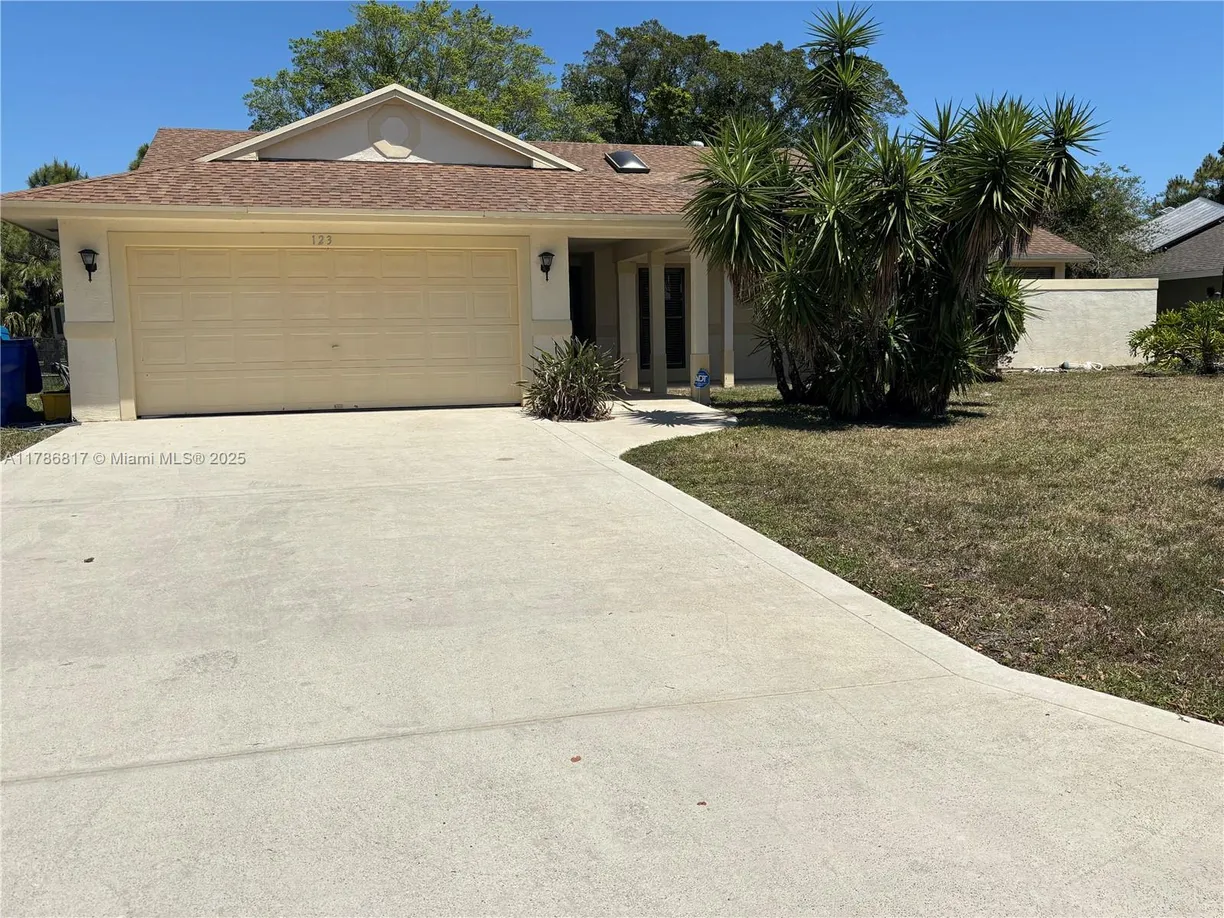 South Florida Real Estate | View 123 Sandpiper Ave | 3 Beds, 2 Baths