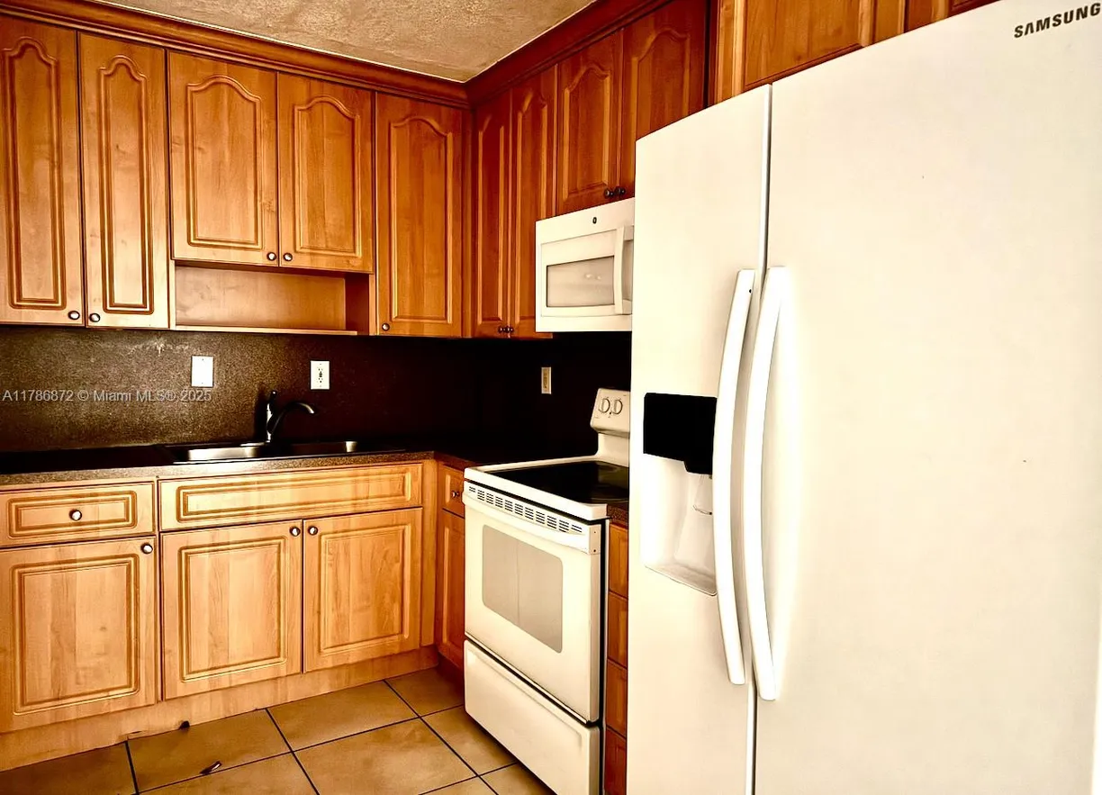 South Florida Real Estate | View 6950 W 6th Ave, 405 | 2 Beds, 1 Bath
