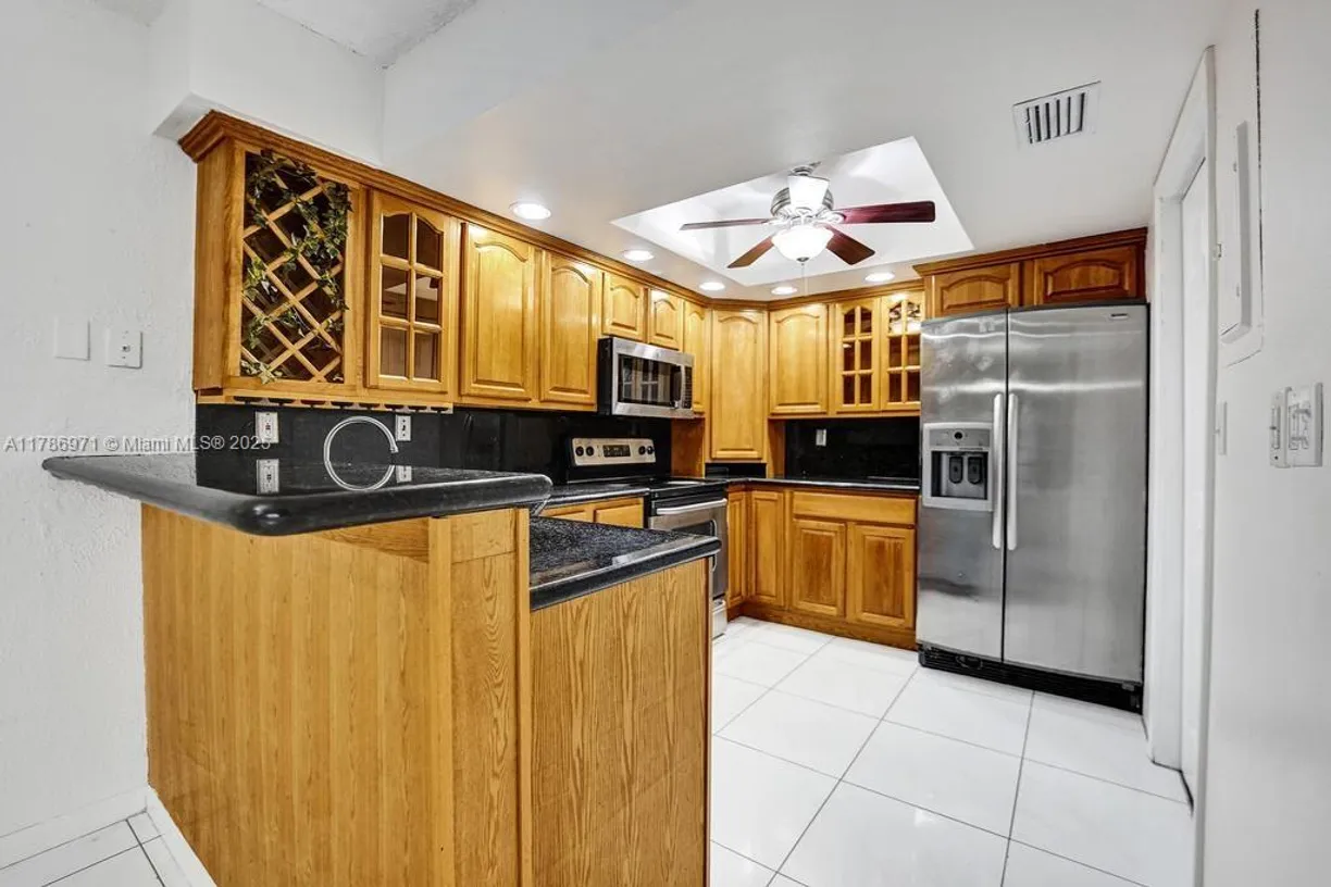 South Florida Real Estate | View 8 Meacham Ln | 3 Beds, 2 Baths