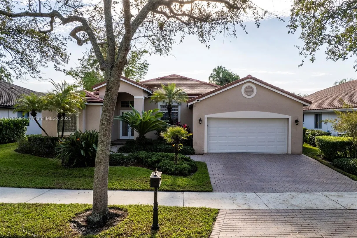 South Florida Real Estate | View 2724 Oakbrook Dr | 4 Beds, 3 Baths