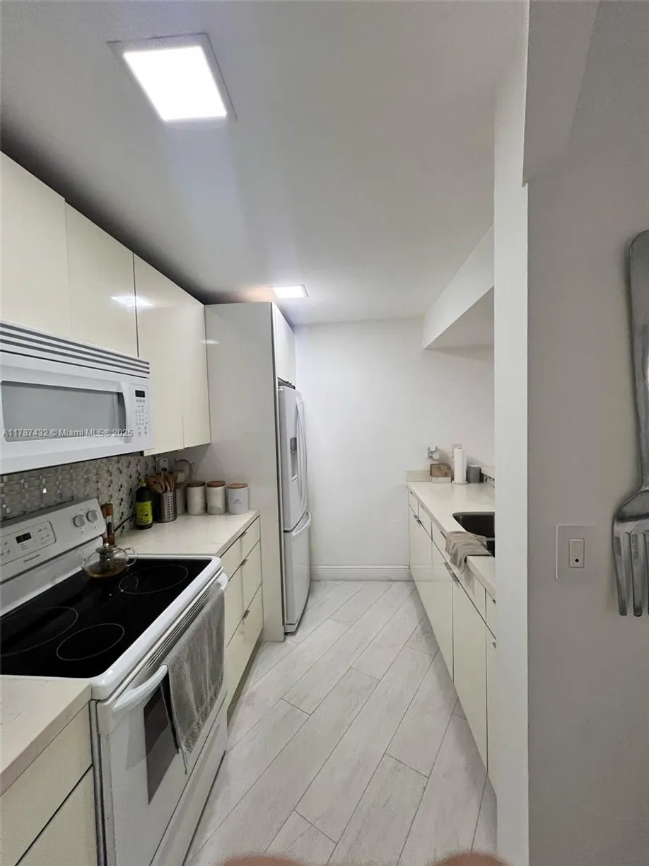 South Florida Real Estate | View 6955 NW 186th St, F104 | Listing