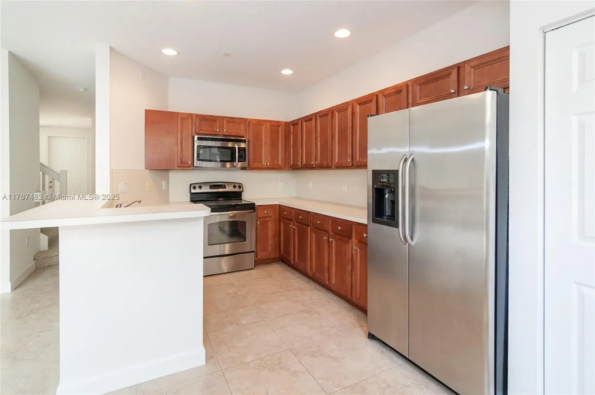 South Florida Real Estate | View 1028 NE 207th Ter, 1028 | 3 Beds, 2 Baths