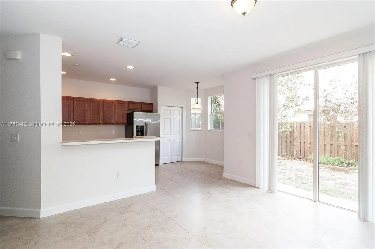 South Florida Real Estate | View 1028 NE 207th Ter, 1028 | Listing