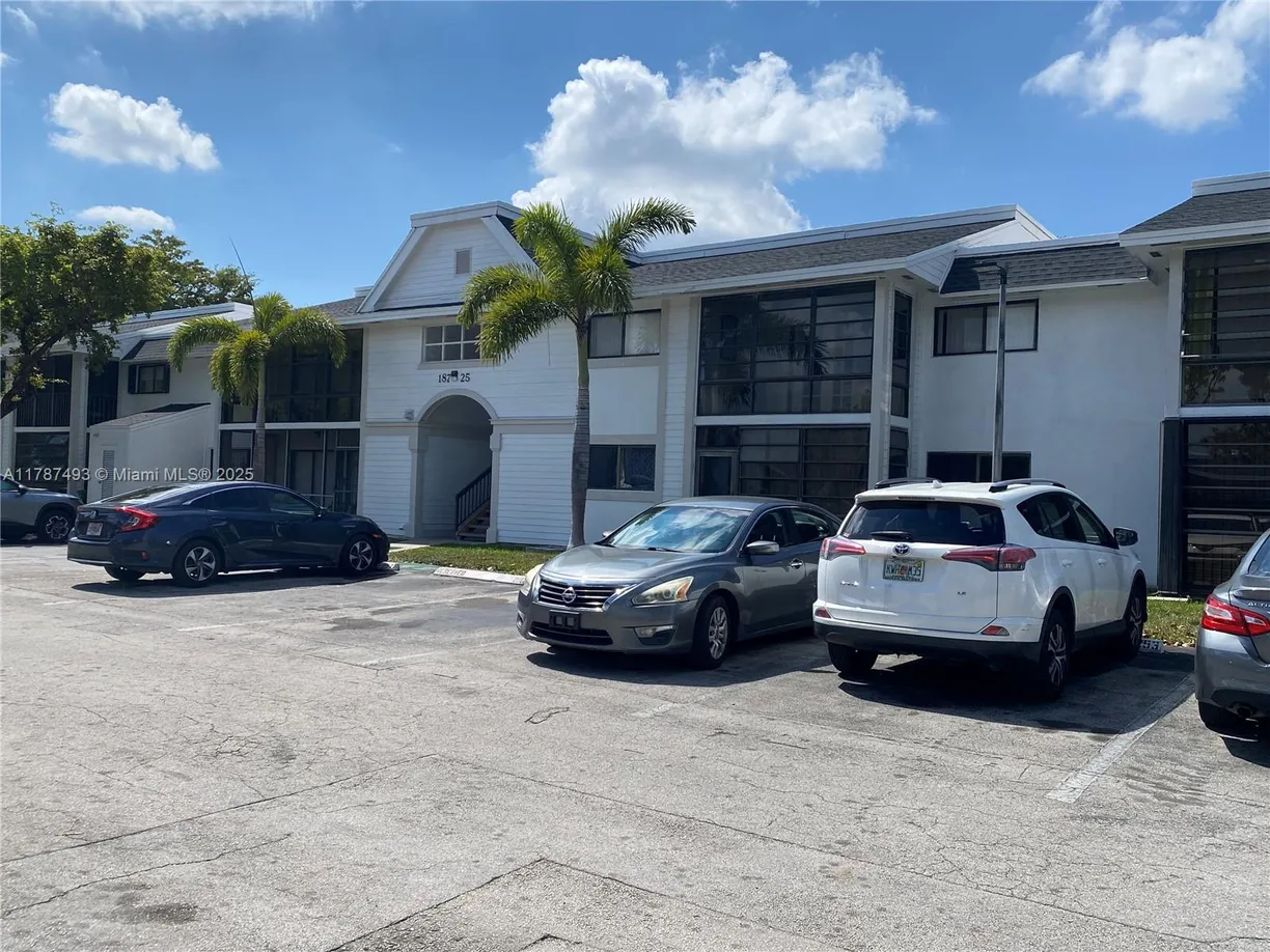 South Florida Real Estate | View 18815 NW 62nd Ave, 103 | 2 Beds, 2 Baths
