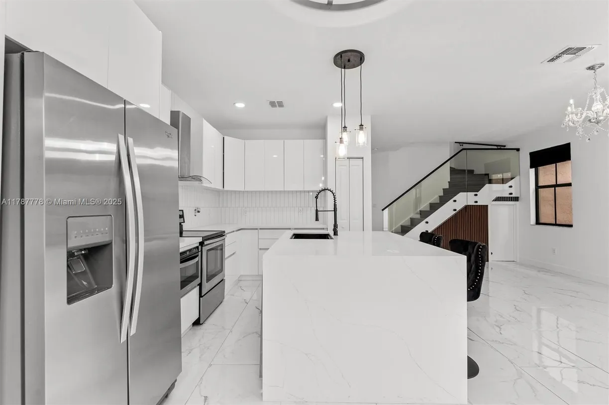 South Florida Real Estate | View 4814 NW 56th Ct | 3 Beds, 2 Baths