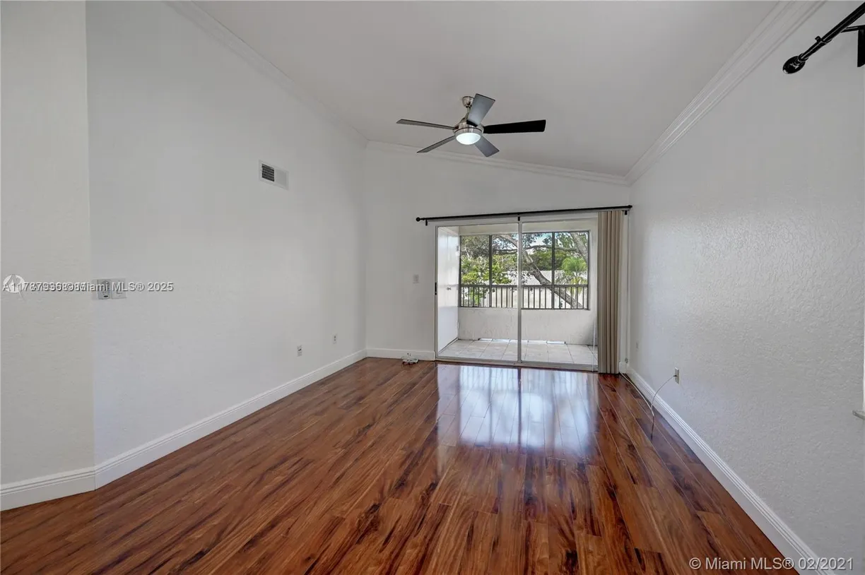 South Florida Real Estate | View 2850 N Oakland Forest Dr, 202 | Listing