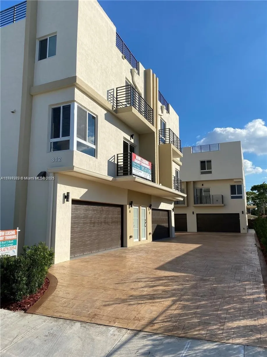 South Florida Real Estate | View 312 E 6th St, A | 3 Beds, 3 Baths