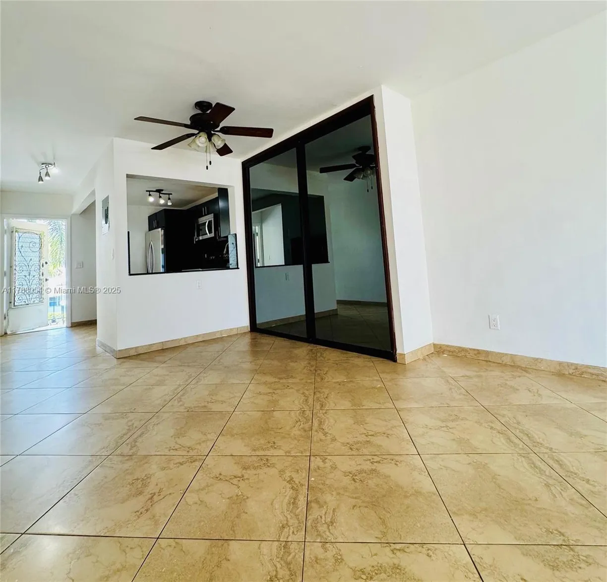 South Florida Real Estate | View 450 E Paradise Isle Blvd, 208 | Listing