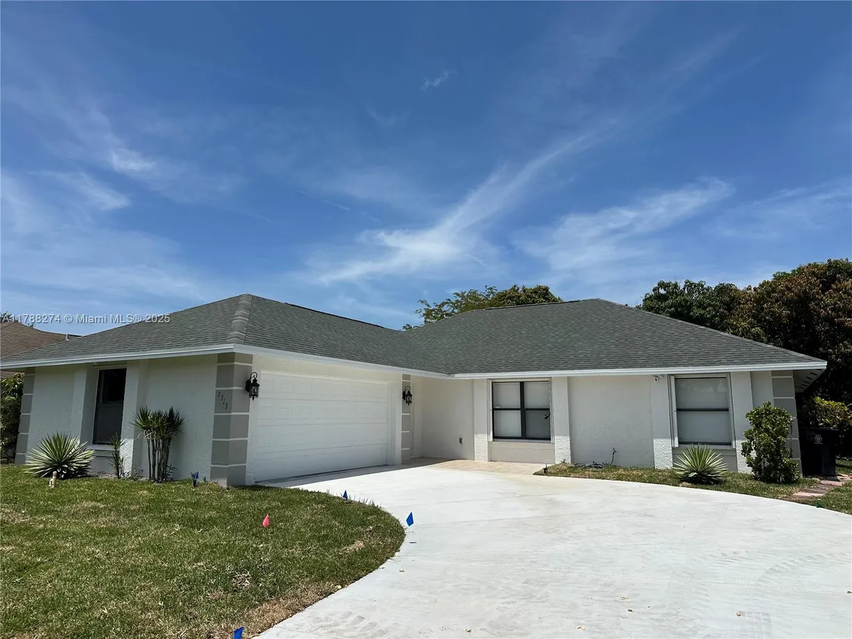 South Florida Real Estate | View 2313 SE Harrington Ave | 3 Beds, 2 Baths