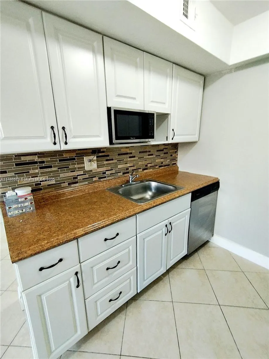 South Florida Real Estate | View 5701 NW 21st St, 17-A | Listing