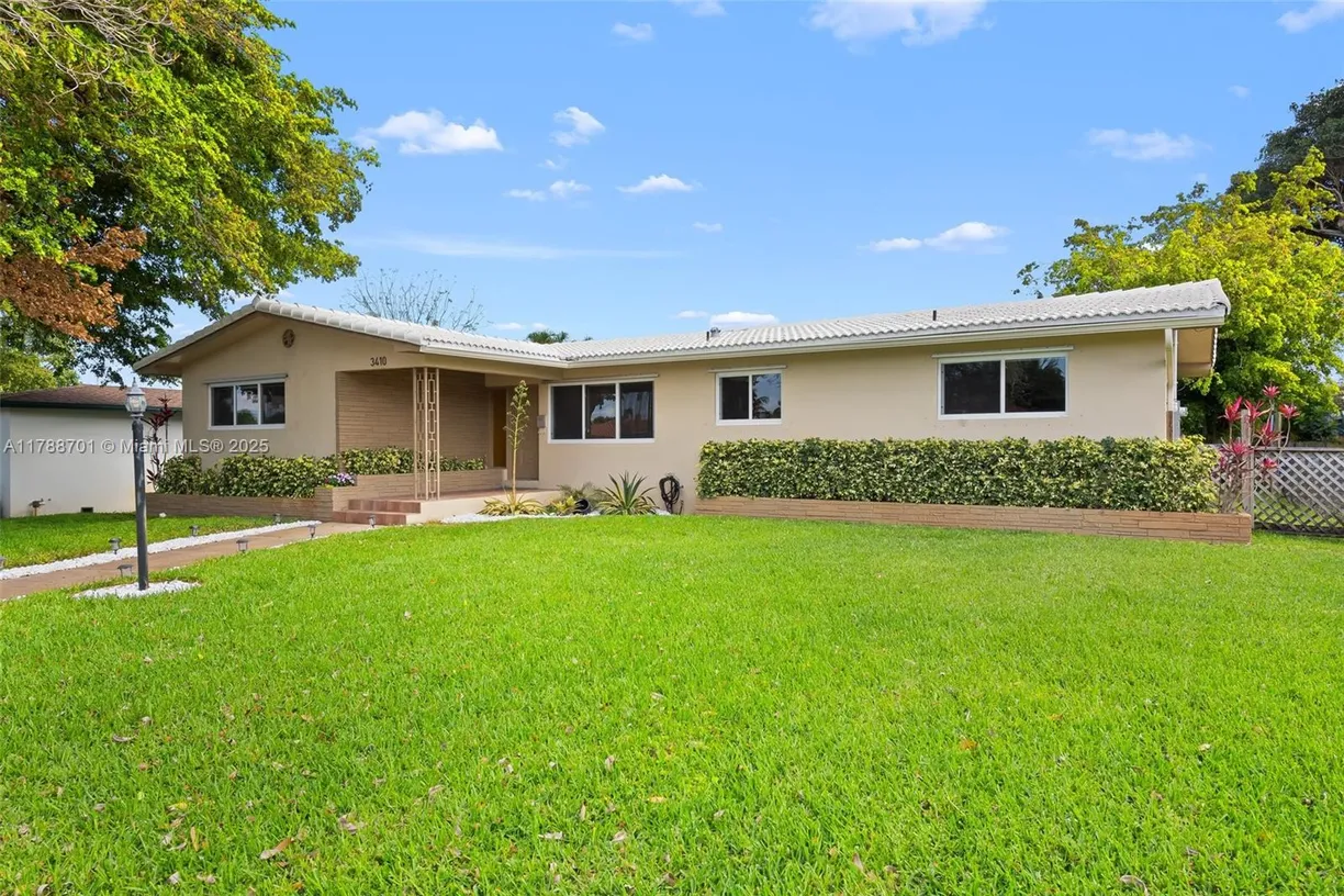 South Florida Real Estate | View 3410 Cleveland St | 4 Beds, 2 Baths