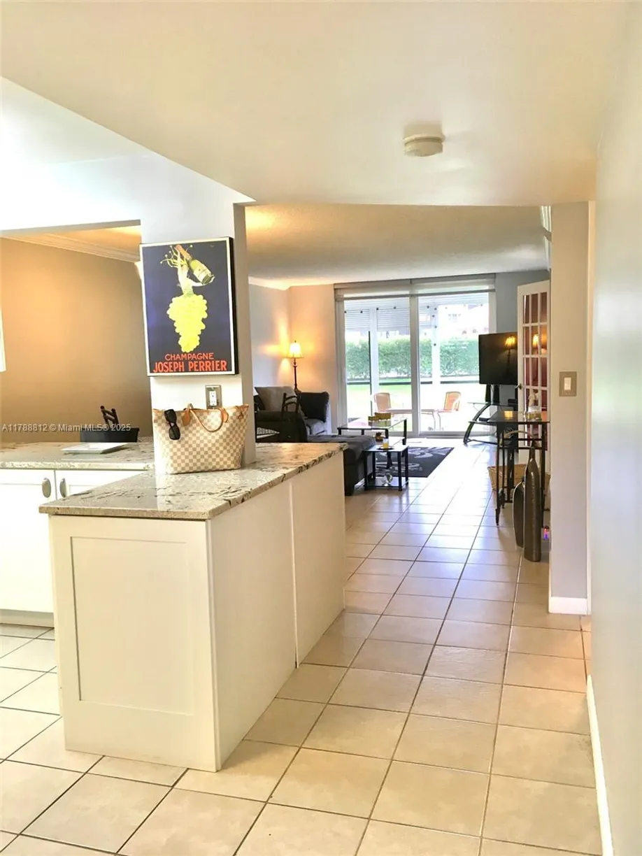 South Florida Real Estate | View 9410 N HOLLYBROOK LAKE DR, 103 | Listing
