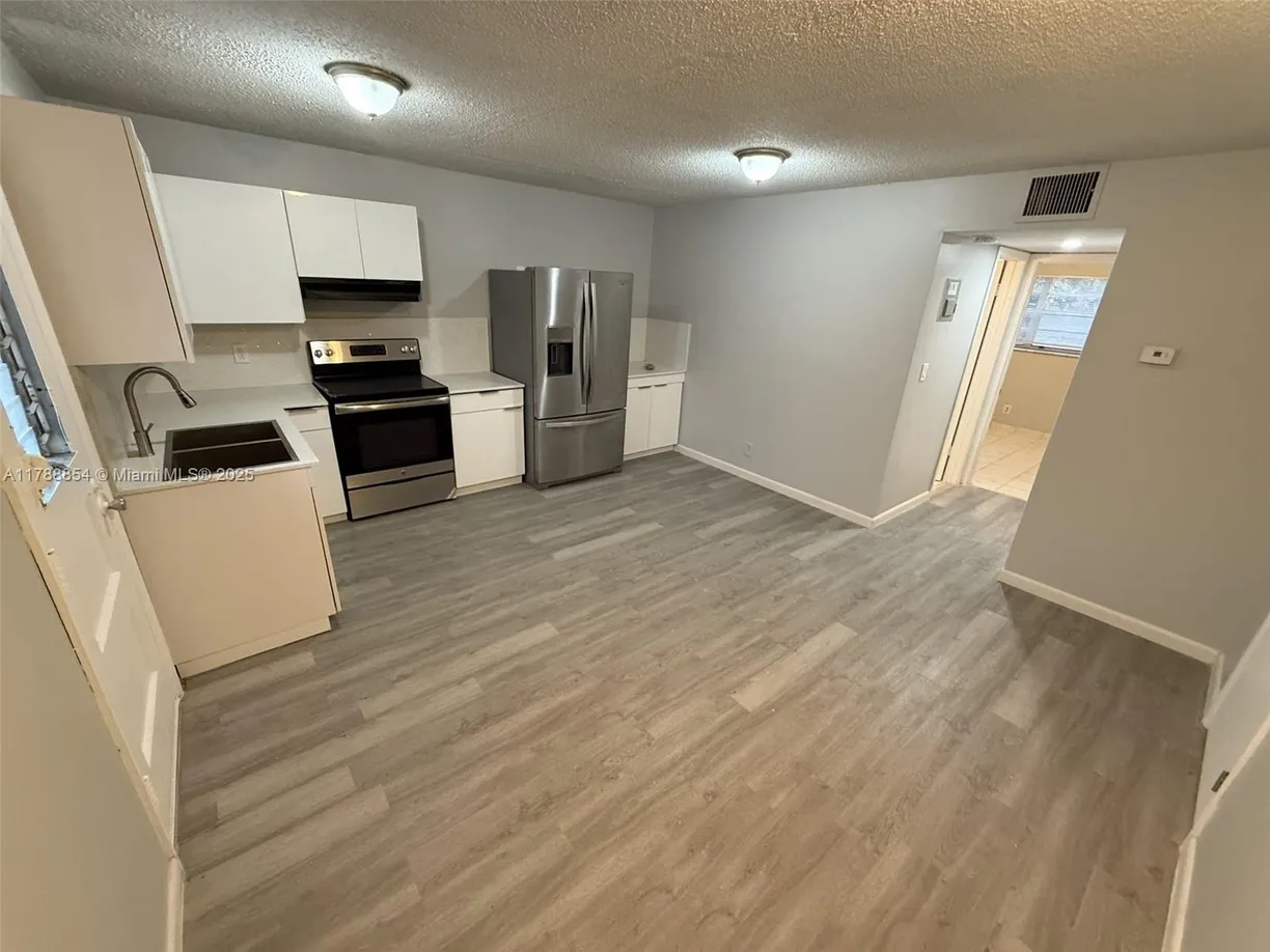 South Florida Real Estate | View 6840 Pembroke Rd, 215 | 3 Beds, 1 Bath