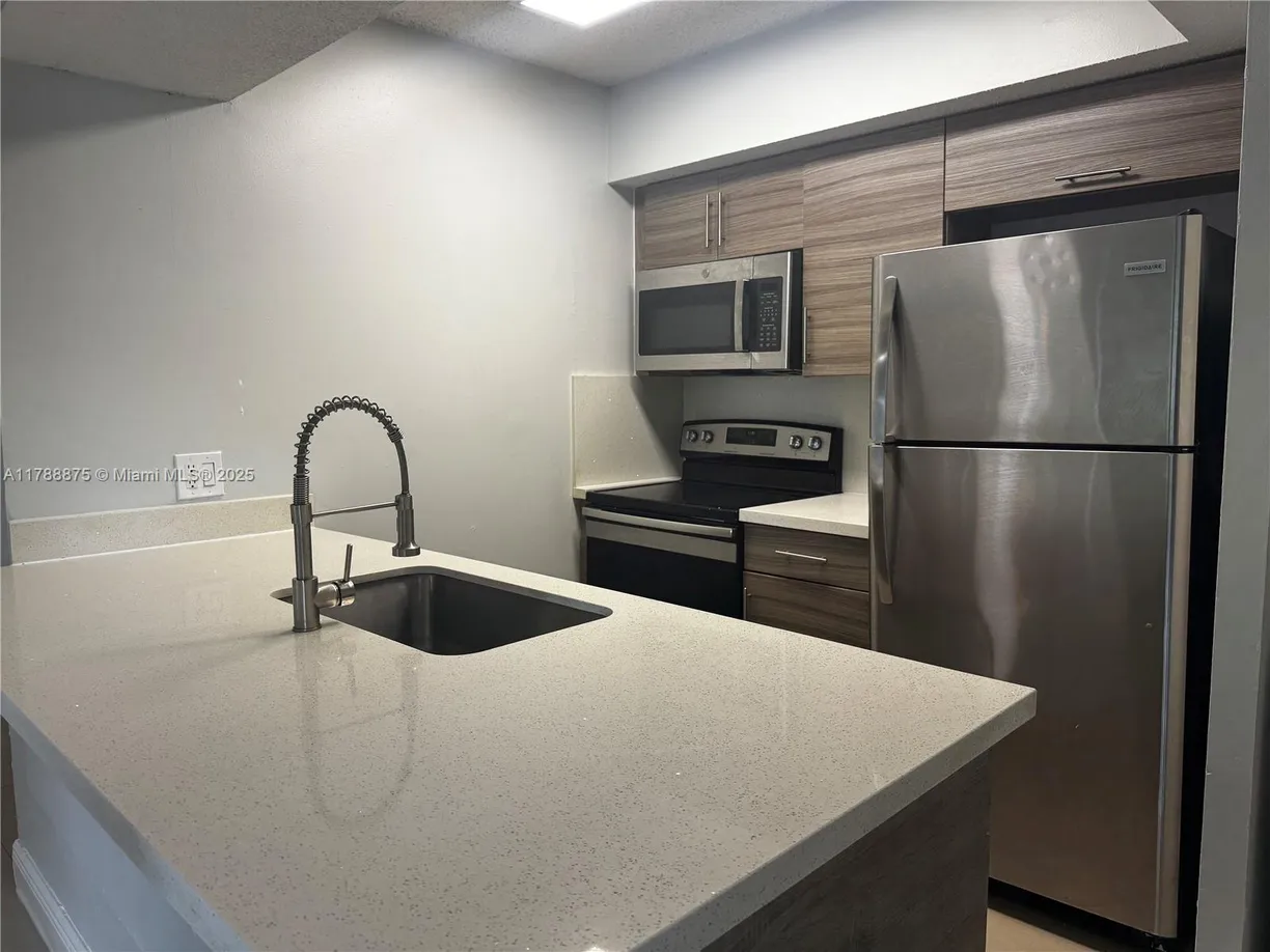 South Florida Real Estate | View 5780 Rock Island Rd, 360 | 1 Bed, 1 Bath