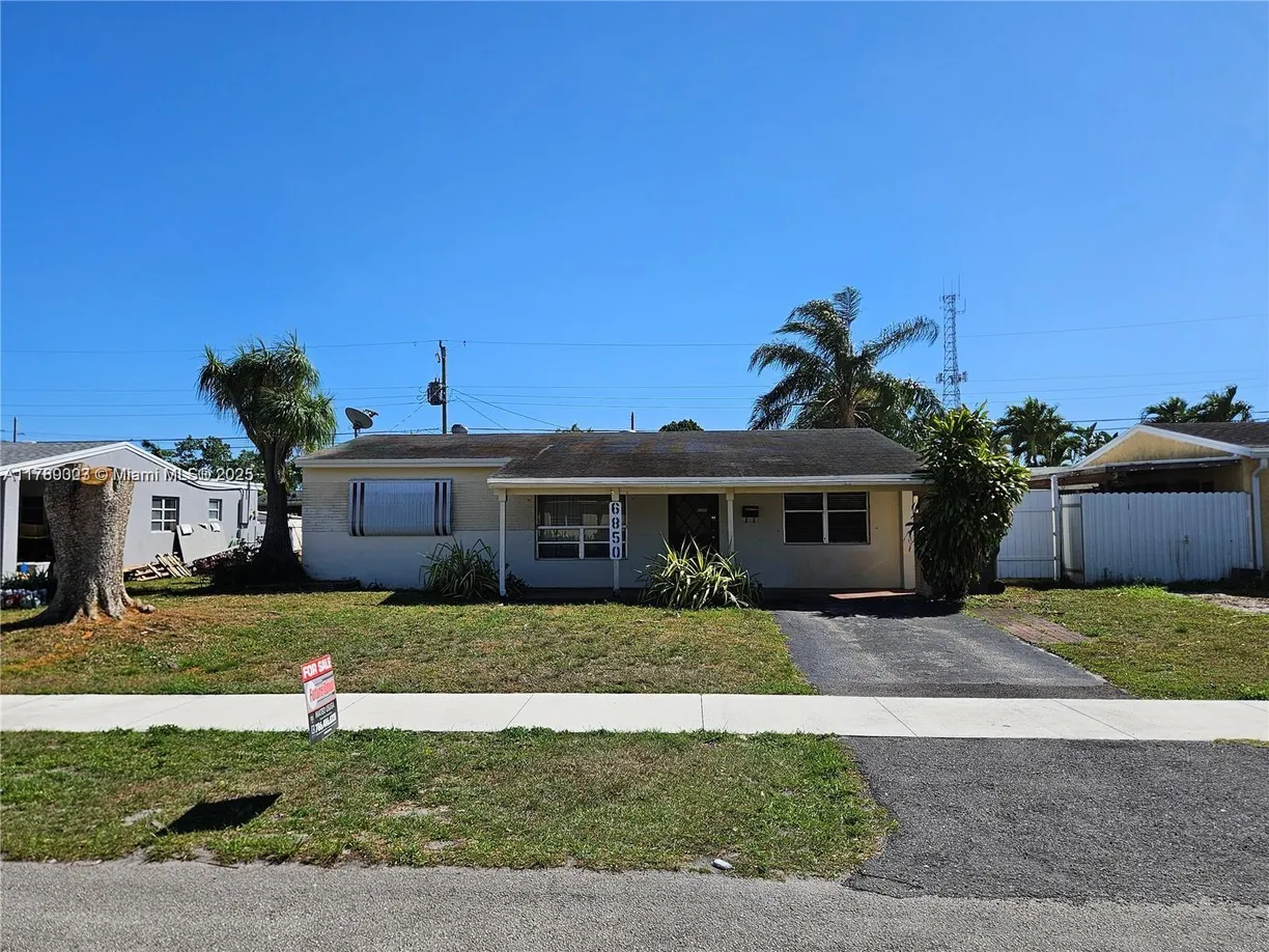 South Florida Real Estate | View 6850 Raleigh St | 4 Beds, 2 Baths