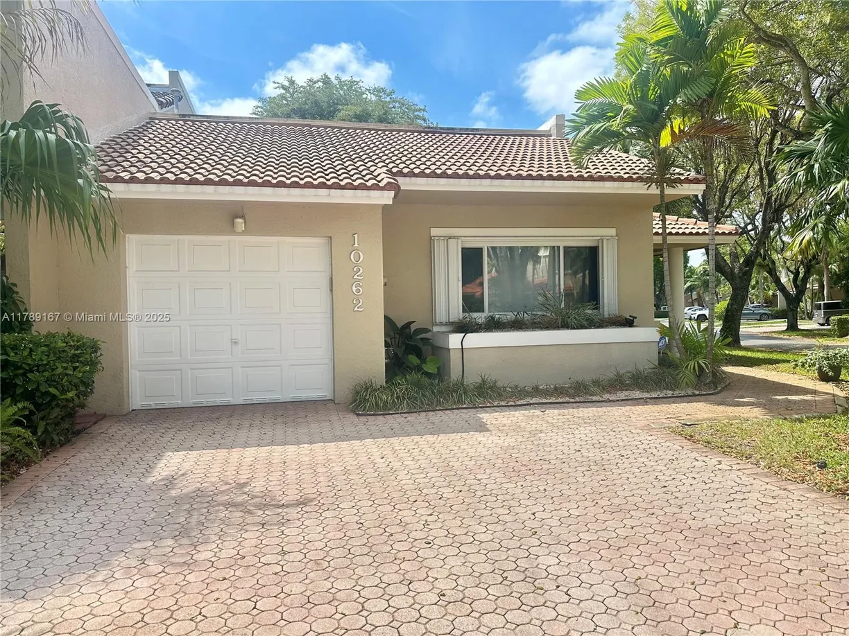 South Florida Real Estate | View 10262 NW 52nd Ln | 3 Beds, 2 Baths