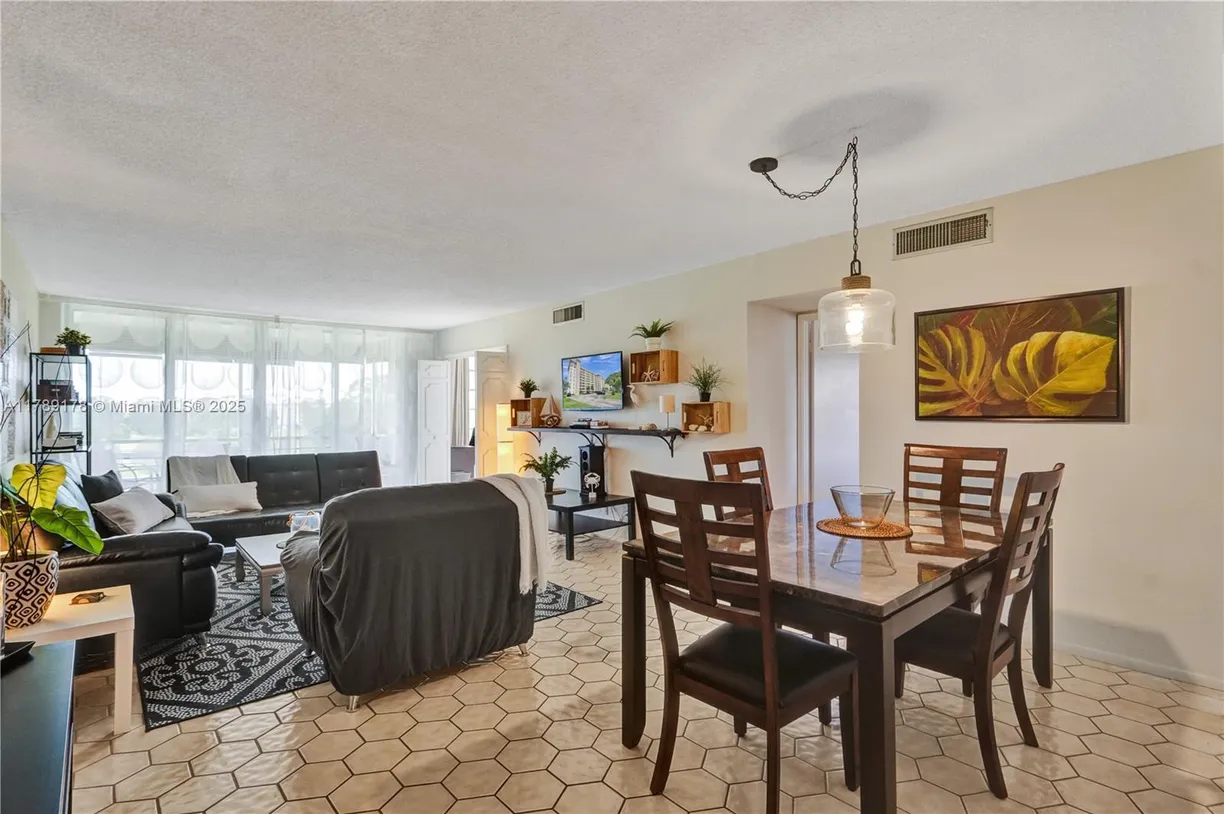 South Florida Real Estate | View 2671 S Course Dr, 409 | Listing