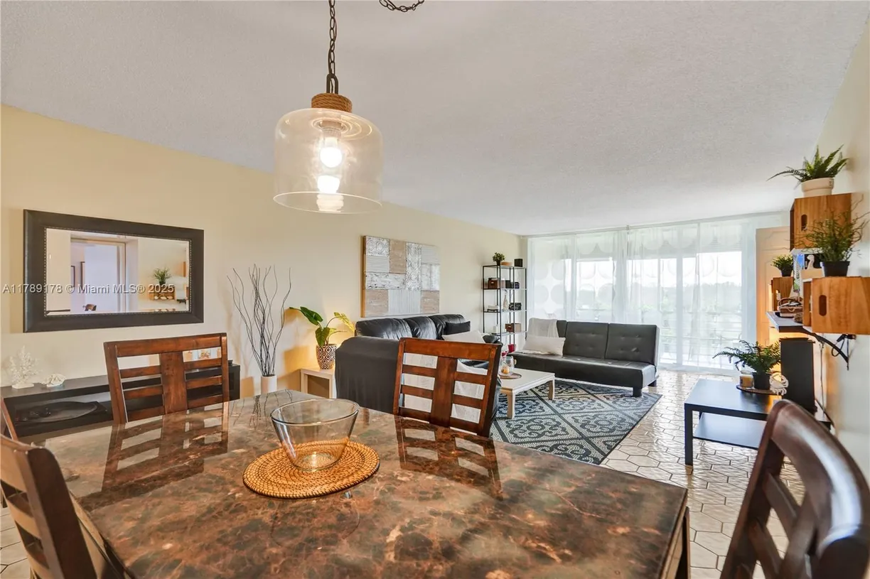 South Florida Real Estate | View 2671 S Course Dr, 409 | Listing