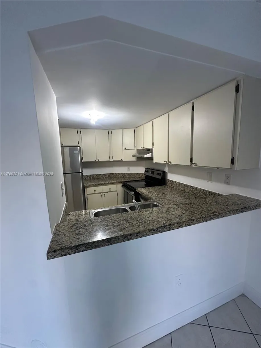 South Florida Real Estate | View 7165 NW 186th St, A103 | 1 Bed, 1 Bath