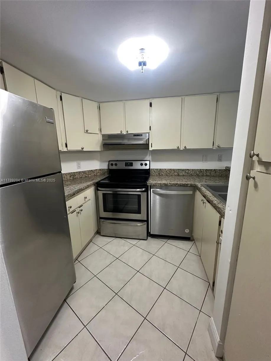 South Florida Real Estate | View 7165 NW 186th St, A103 | Listing