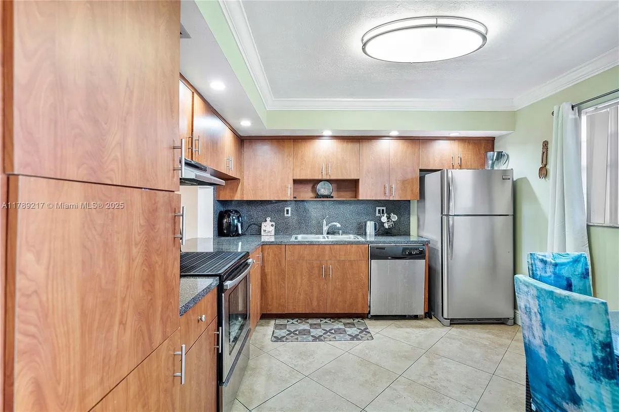 South Florida Real Estate | View 4930 E Sabal Palm Blvd, 312 | 2 Beds, 2 Baths