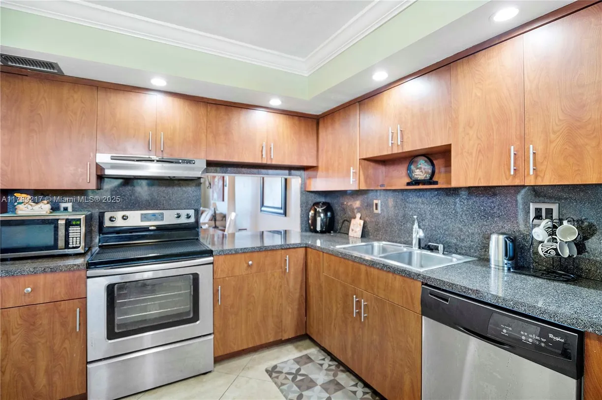 South Florida Real Estate | View 4930 E Sabal Palm Blvd, 312 | Listing