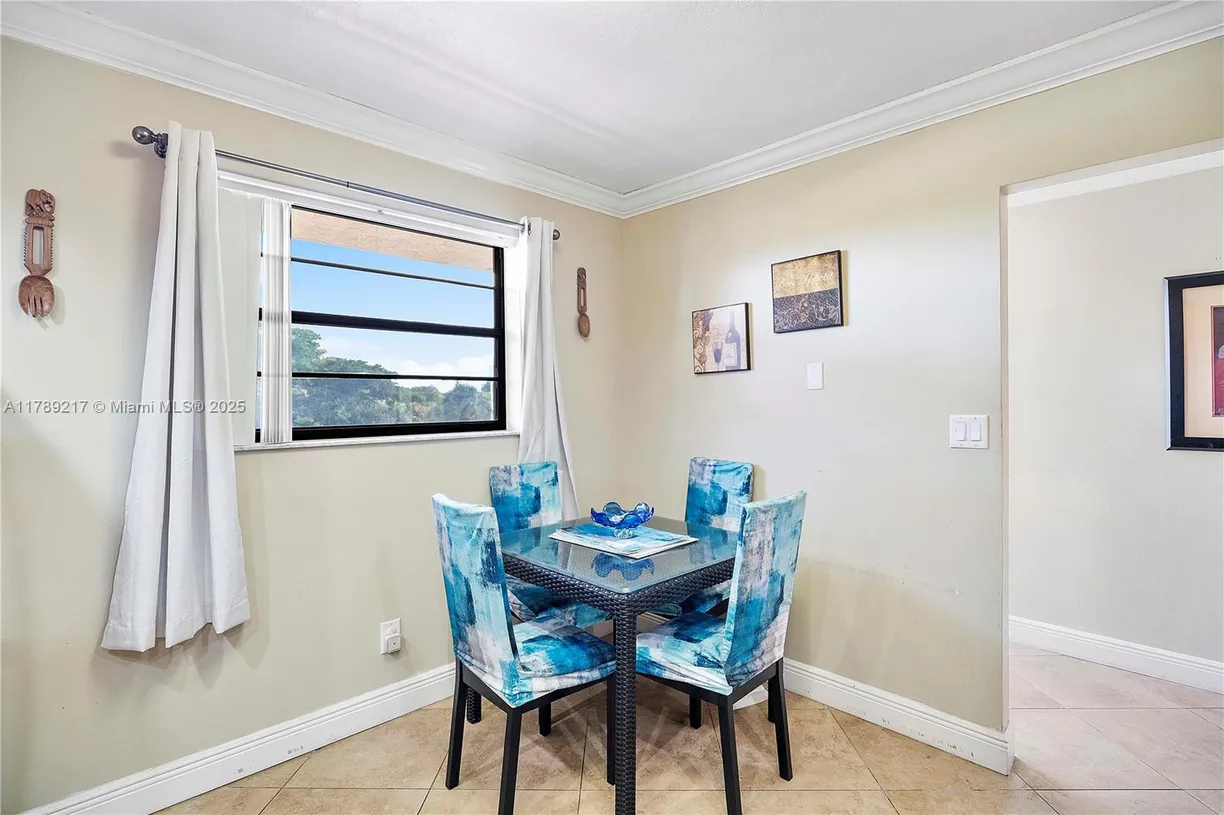South Florida Real Estate | View 4930 E Sabal Palm Blvd, 312 | Listing