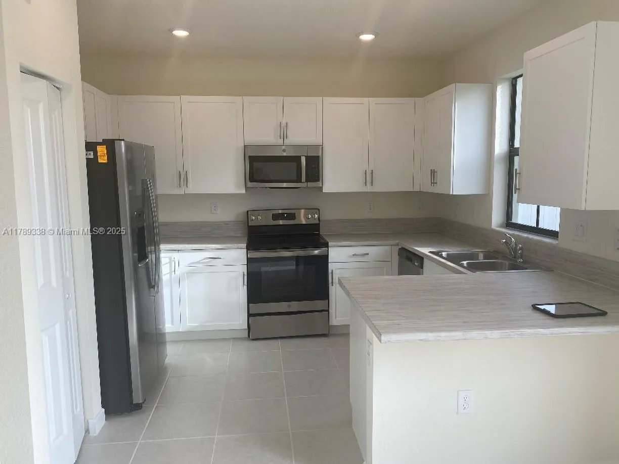 South Florida Real Estate | View 11075 W 33rd Ct | Listing