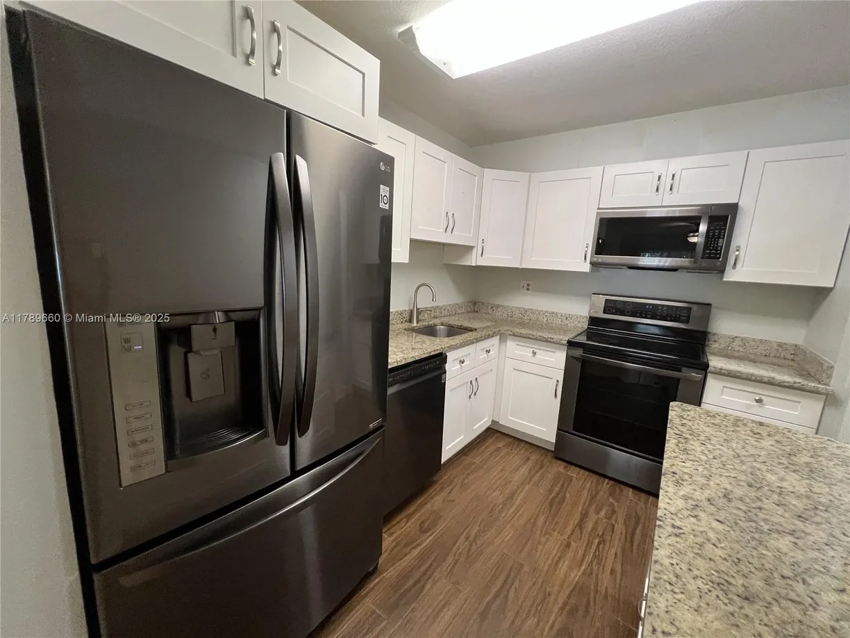 South Florida Real Estate | View 4354 NW 9th Ave, 13-1C | 2 Beds, 2 Baths