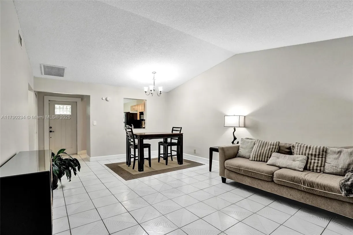 South Florida Real Estate | View 6179 Pine Tree Ln, B | Listing