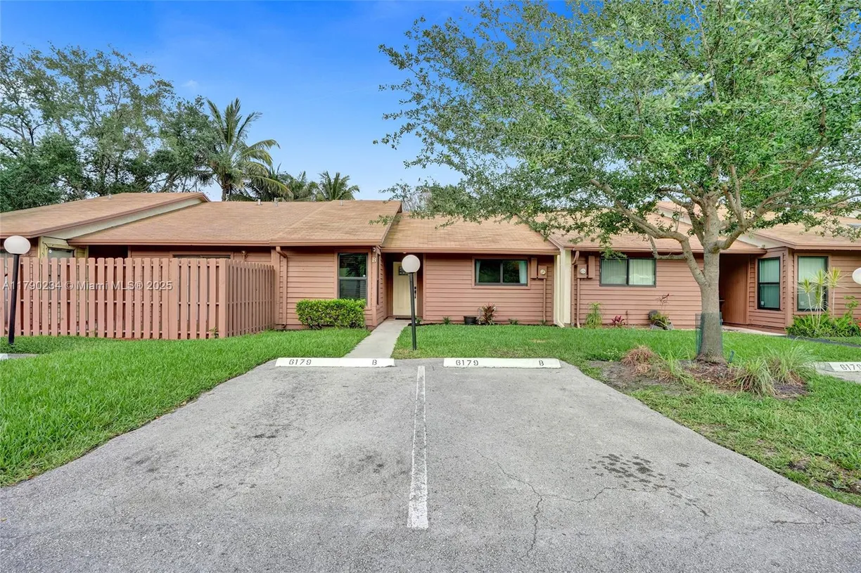 South Florida Real Estate | View 6179 Pine Tree Ln, B | 2 Beds, 2 Baths