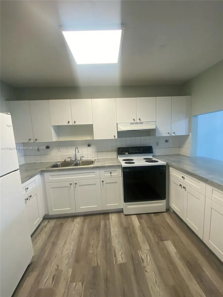 South Florida Real Estate | View 305 W 68th St, 212 | 2 Beds, 2 Baths