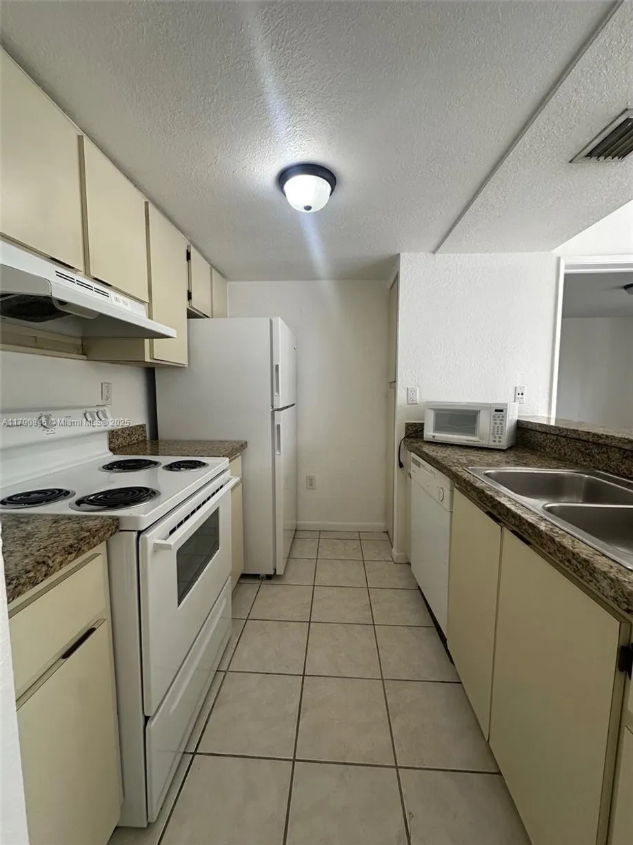 South Florida Real Estate | View 7125 NW 186th St, B208 | 2 Beds, 2 Baths