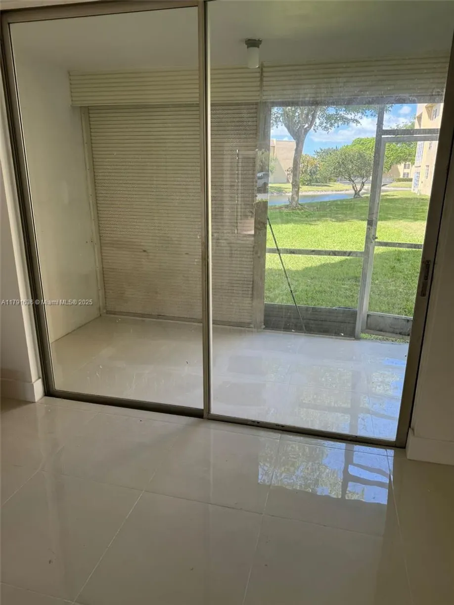 South Florida Real Estate | View 5980 NW 64th, 105 | 1 Bed, 1 Bath