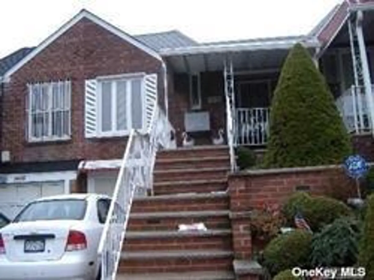 New York City Real Estate | View 71-14 Calamus Avenue | 3 Beds, 2 Baths