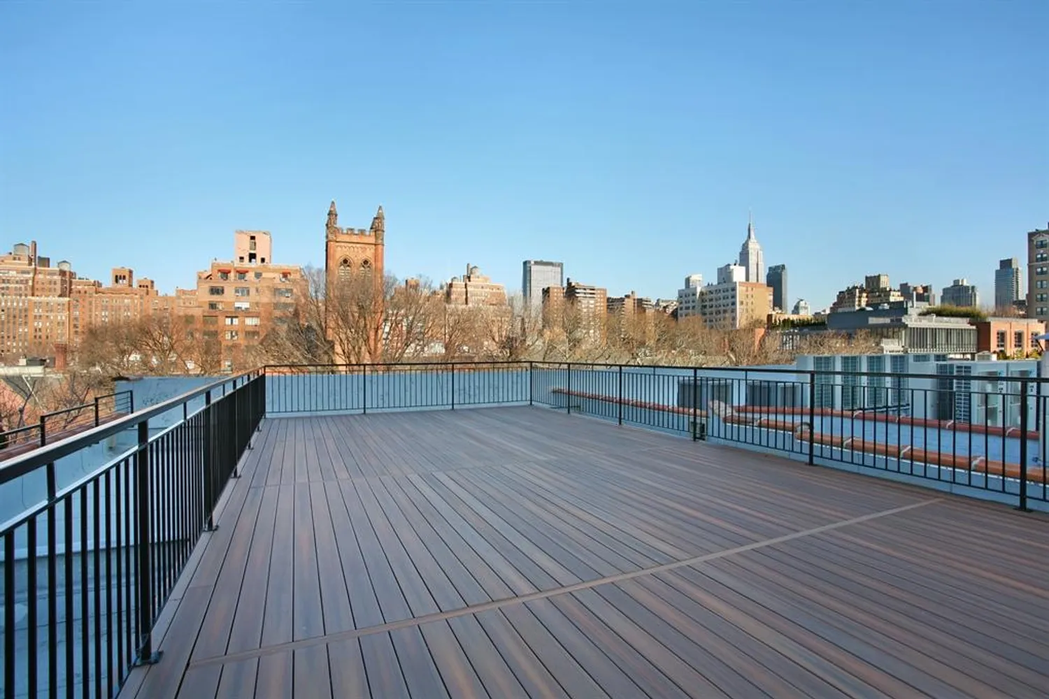 Common Roof Deck - Enjoy City Views and Sunsets!