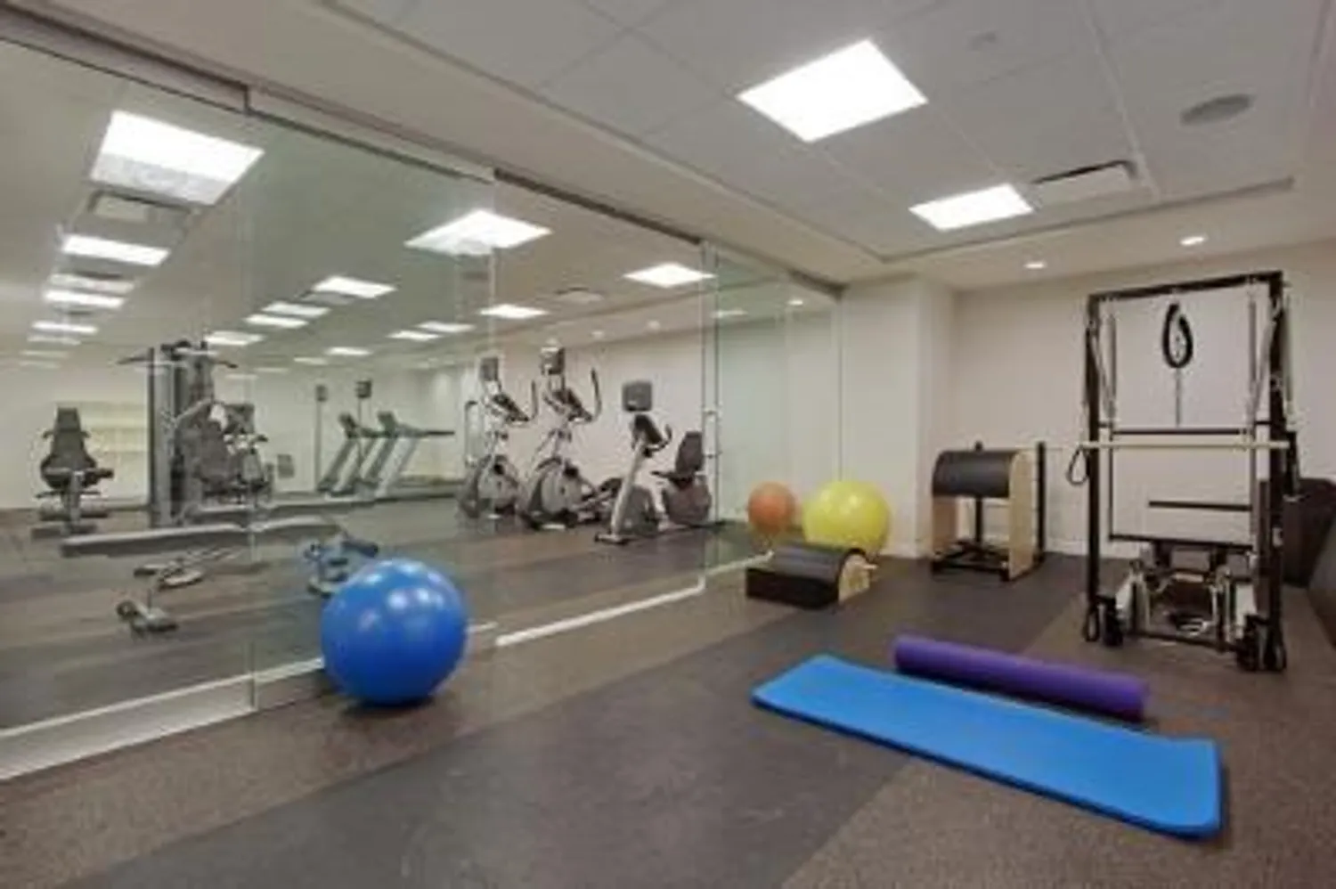 Full fitness center with pilates and yoga studio