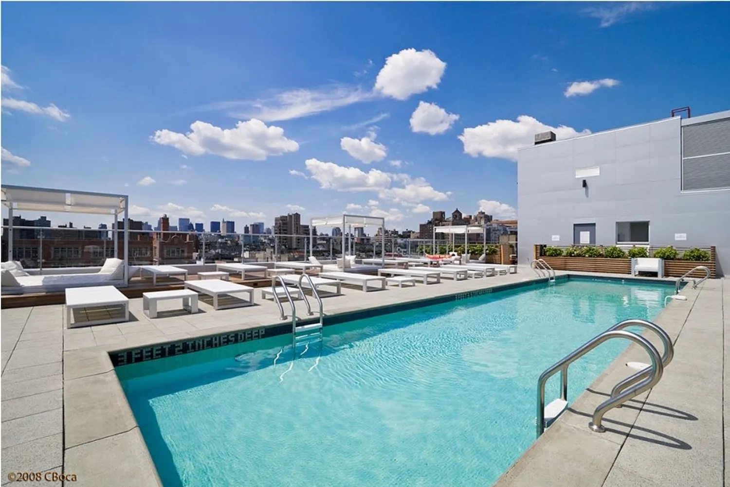 Rooftop pool with cabanas