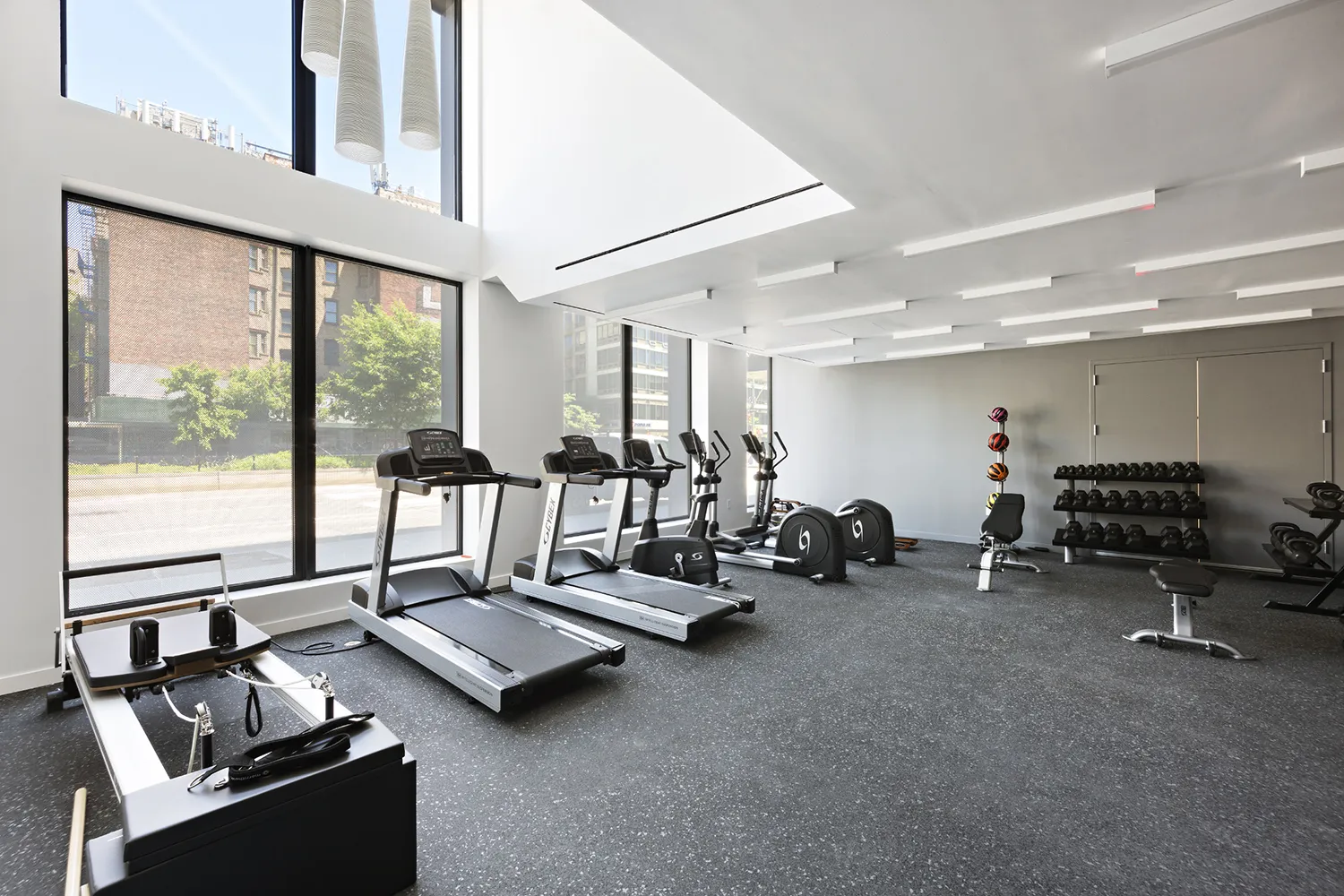 Bright, windowed fully equipped fitness room