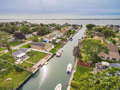 Homes for sale in East Quogue | View 20 Tarpon Road | 3 Beds, 2 Baths